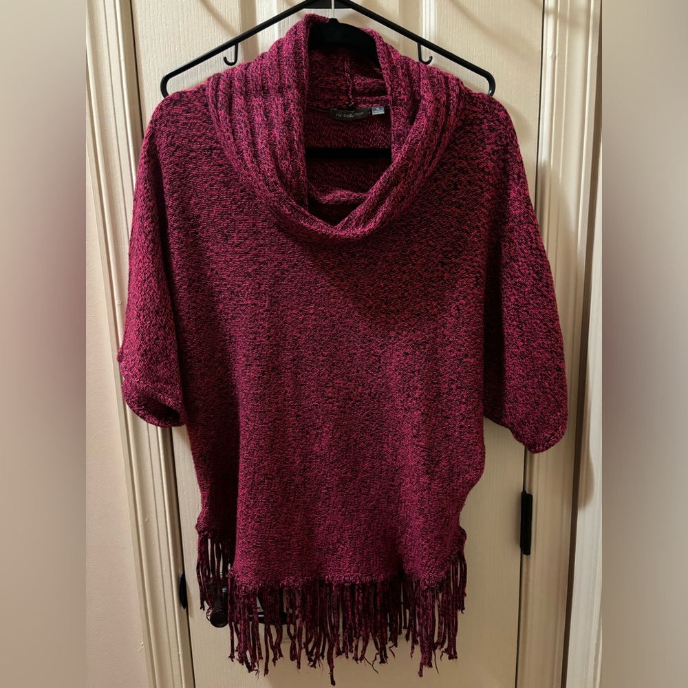 kids XL pink and black speckled poncho. Adult medium